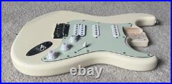 2024 Squier by Fender Loaded HSS Stratocaster Olympic White 60's Mint Green