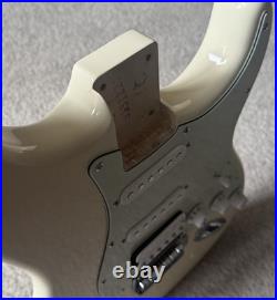 2024 Squier by Fender Loaded HSS Stratocaster Olympic White 60's Mint Green