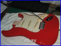 Red Loaded Strat Style Body. Big block trem. AlnicoV pickups. Full thickness