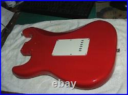 Red Loaded Strat Style Body. Big block trem. AlnicoV pickups. Full thickness