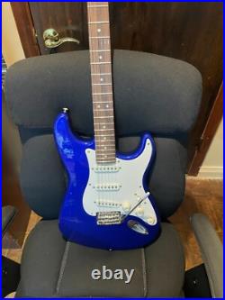 Rich blue strat squier loaded pick guard chrome tuners and my own co name